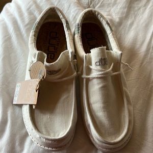 Brand new never worn off white Hey Dudes.